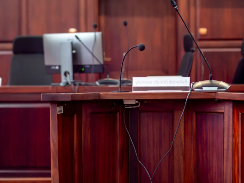 Borrowed From the Bereaved: How Funeral Parlor Seating Quietly Designed Every Press Conference in America
